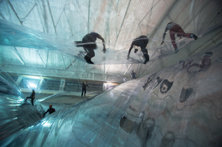Illustration for article titled Being Trapped Inside This Giant Plastic Space Time Foam Art Installation Looks Like Out of This World Fun